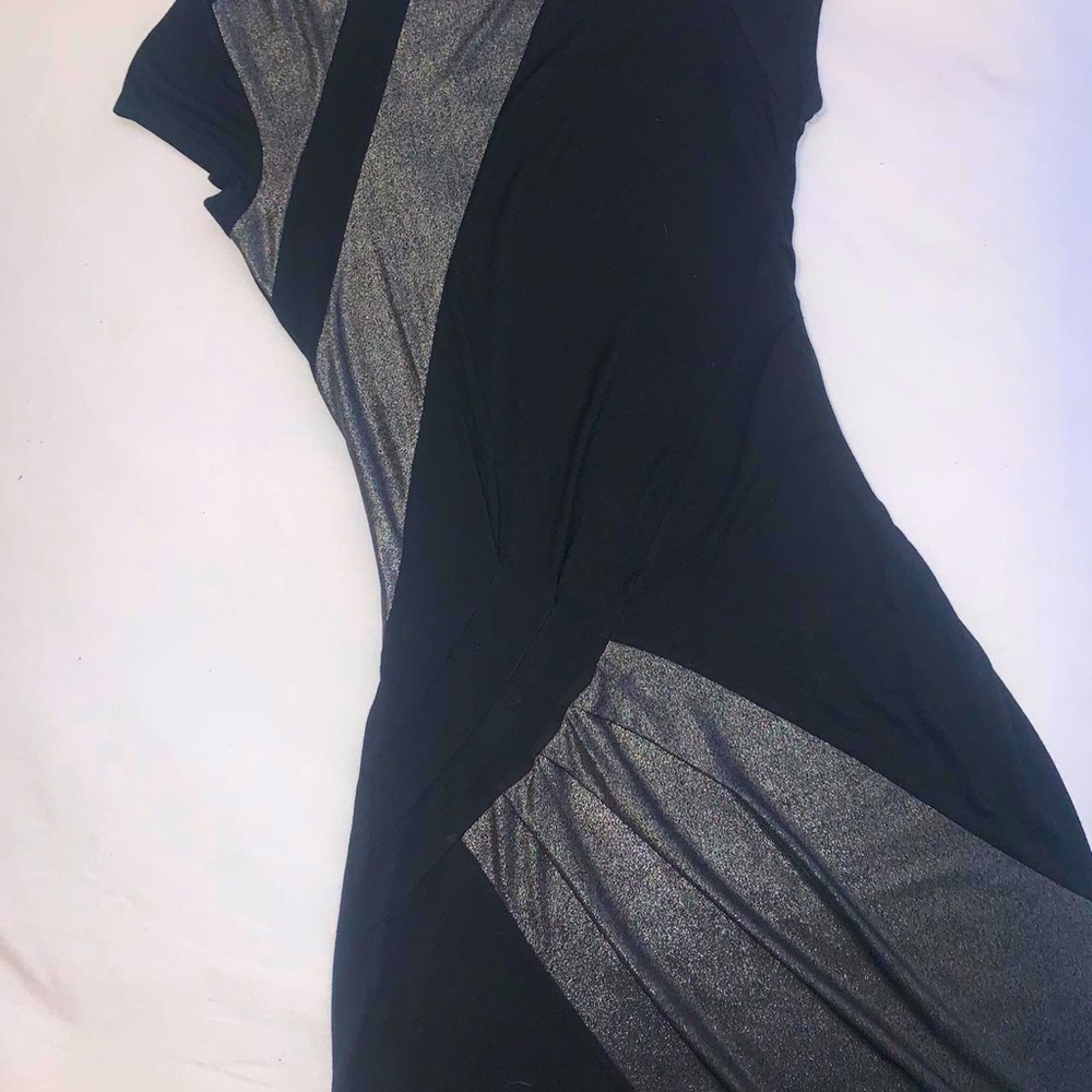 Small black party dress with silver accents